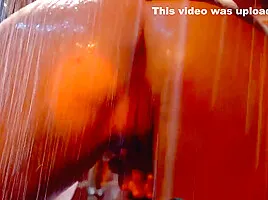 Two Busty Lesbians Lick And Fuck Their Pussies In The Rain