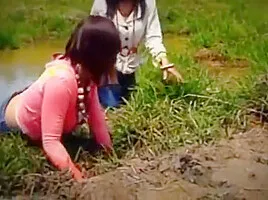 Two Thai Girls In Muddy Thigh Boots!!!